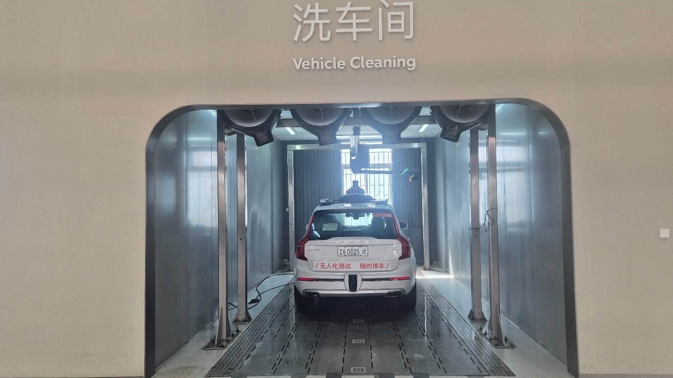 From robotaxis to private L4 cars: what a week in China taught us about the future of autonomous mobility 4 A robotaxi entering the automated vehicle cleaning bay at the DiDi depot